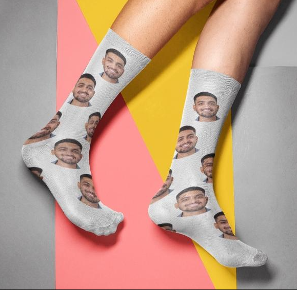 Custom socks fully covered with a portrait design